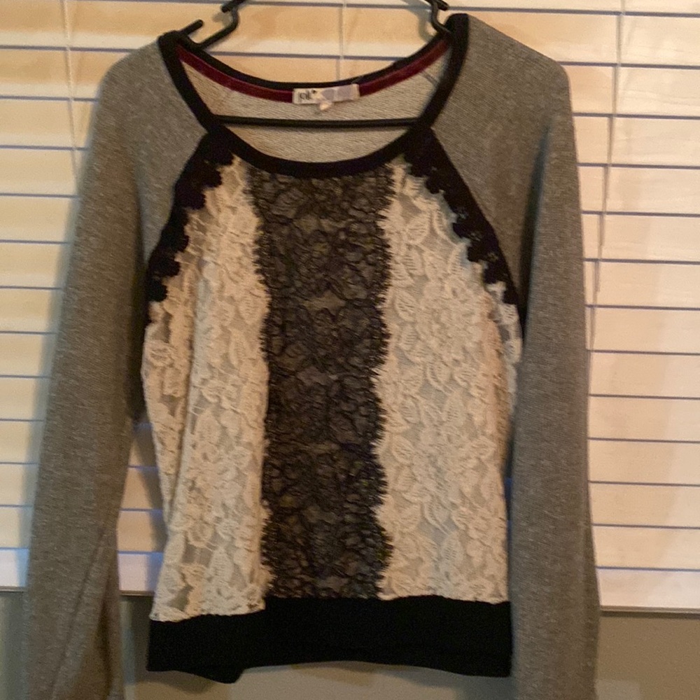 Medium jolt black and. Cream sweater
